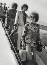 Jimi Hedrix and members of the Experience Band arrive at Heathrow 1960s  Print
