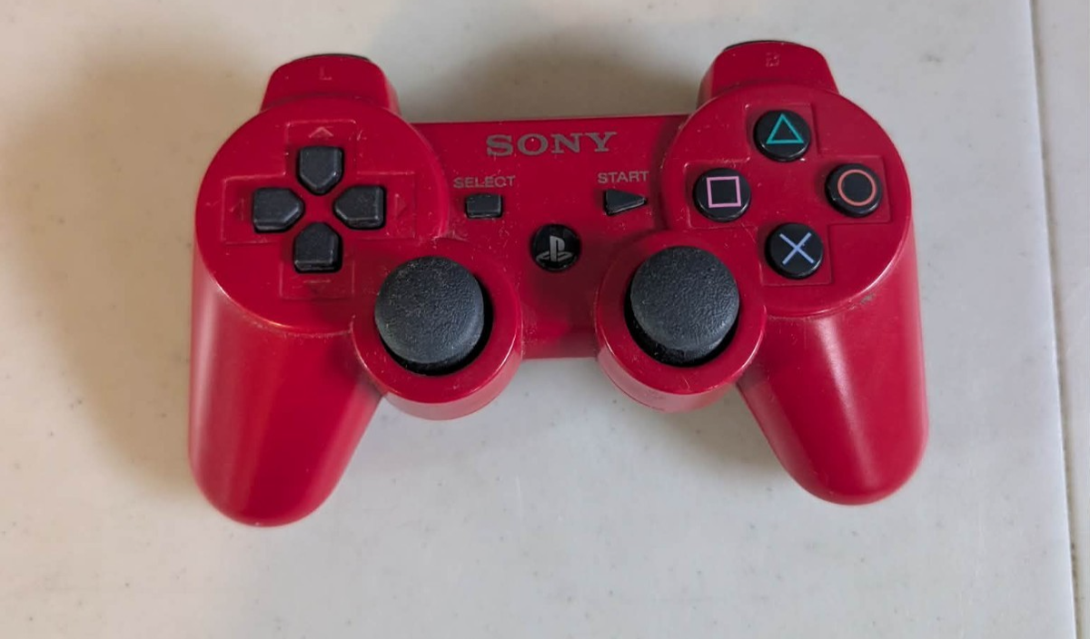 Sony PS3 Super Slim: Red God of War Edition (500GB) Legacy Bundle