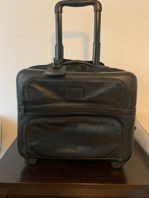 tumi leather luggage