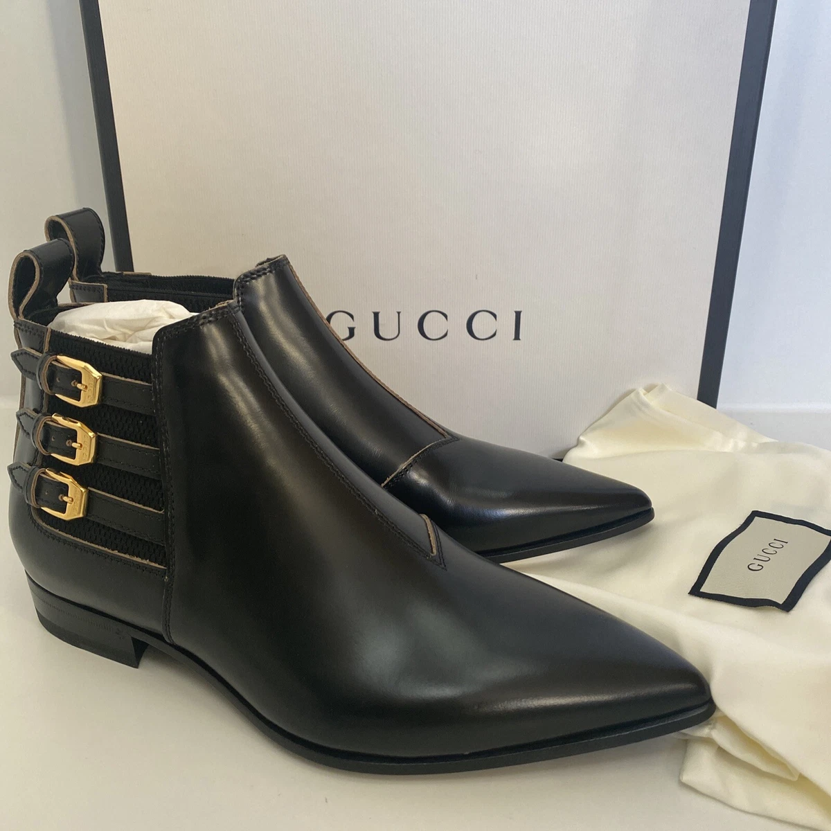 Gucci buckle deals boots