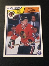 1983-84 O-Pee-Chee Steve Ludzik #106 Rookie RC GUM Stain