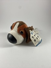 dog with big head and small body stuffed animal