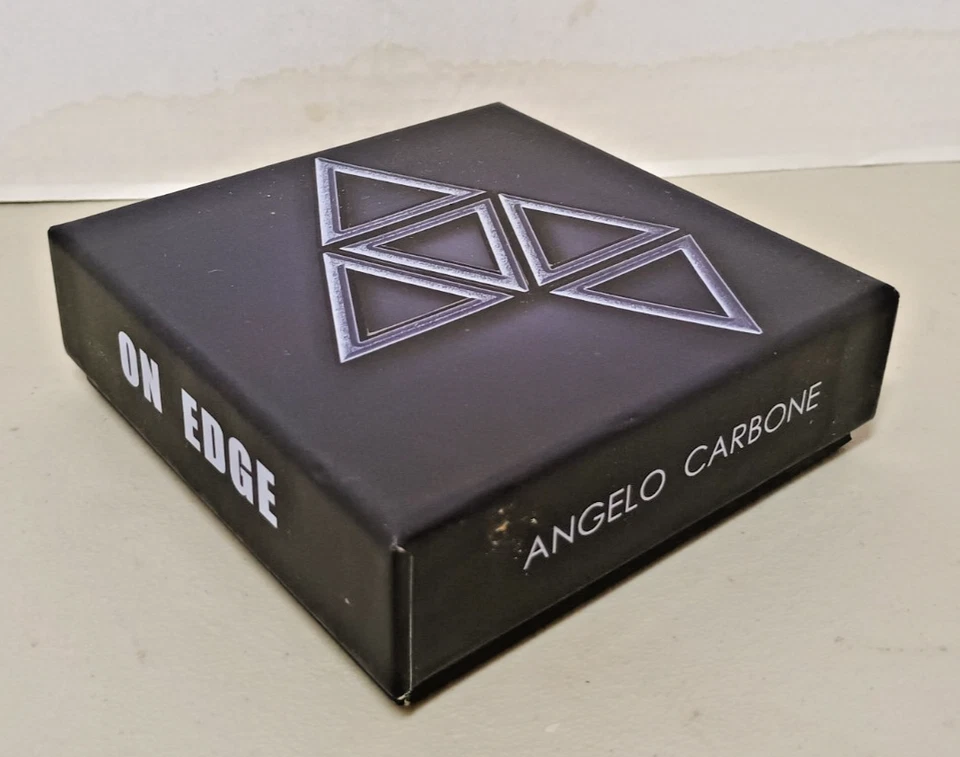 On Edge by Angelo Carbone.  Balancing Card Castle effect. - Image 1 of 1