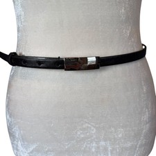 Women's black skinny adjustable leather belt with silver buckle
