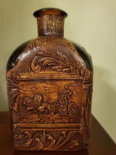 spanish cueros brown leather wrapped 7.5 inch liquior bottle with madrid scener