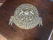 A LARGE ANTIQUE CAST BRASS SAFE PLAQUE, MILNER’S PATENT “212”. 
