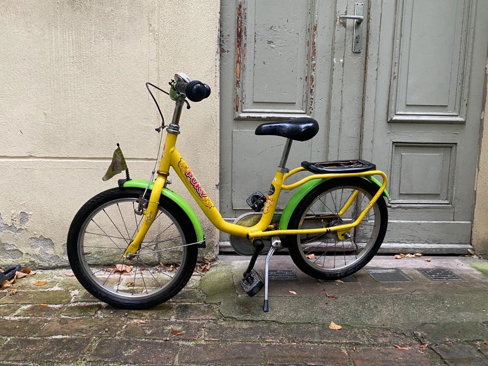 grün-gelbes Puky Kinderfahrrad 18''