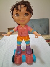Dora Explorer sings in Spanish and English, and skates.