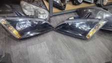 PAR DE FAROS FORD FOCUS MK2 NS OS NEGRO HALÓGENO 
