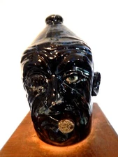 {DEAD EYE ) (lynn thurman walton) face jugs pottery, folkart   ( 10'' x7'' )