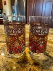 2 Vintage Coca Cola 70's 16 oz Glasses Hippie Daisy Flowers Orange Yellow Brown
