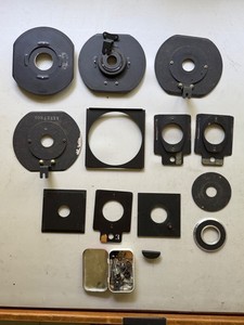 Enlarger lens boards, rings, and some hardware