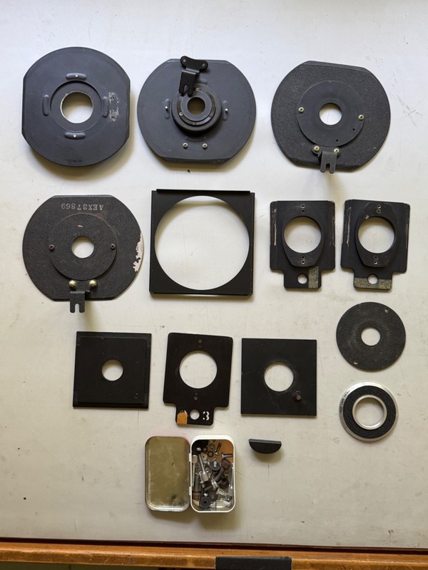 Enlarger lens boards, rings, and some hardware