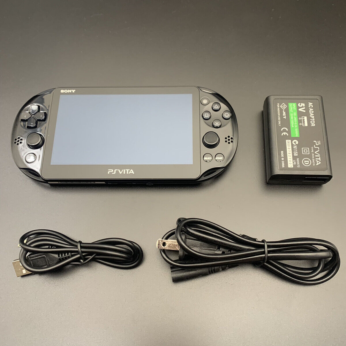 PS Vita PCH-2000 Sony Playstation Console only Choice Charger Used 