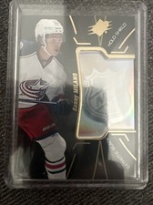 2016-17 Upper Deck SPX Hockey Extreme Black Holo Shield RC #EB-MI Sonny Milano