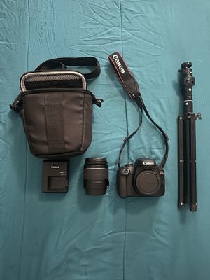 Canon EOS Rebel T100 Digital SLR with 18-55mm Lens, Bag, Charger, Tripod