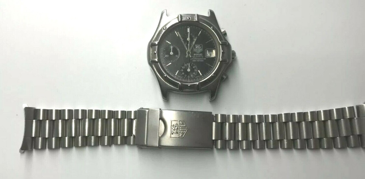 TAG Heuer 時計 Bonhams : Heuer. A rare stainless steel automatic calendar