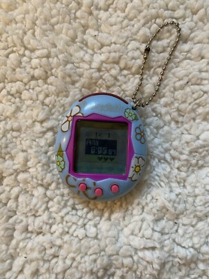 Blue Flowery Tamagotchi V2 2004 wirklich guter Zustand funktioniert und getestet 