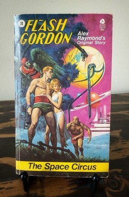 A Vintage 1974 Paperback Copy Of Flash Gordon The Space Circus By A. Raymond