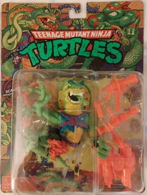 Playmates TMNT Scale Tail Action Figure with Backpack, Blaster & Whip