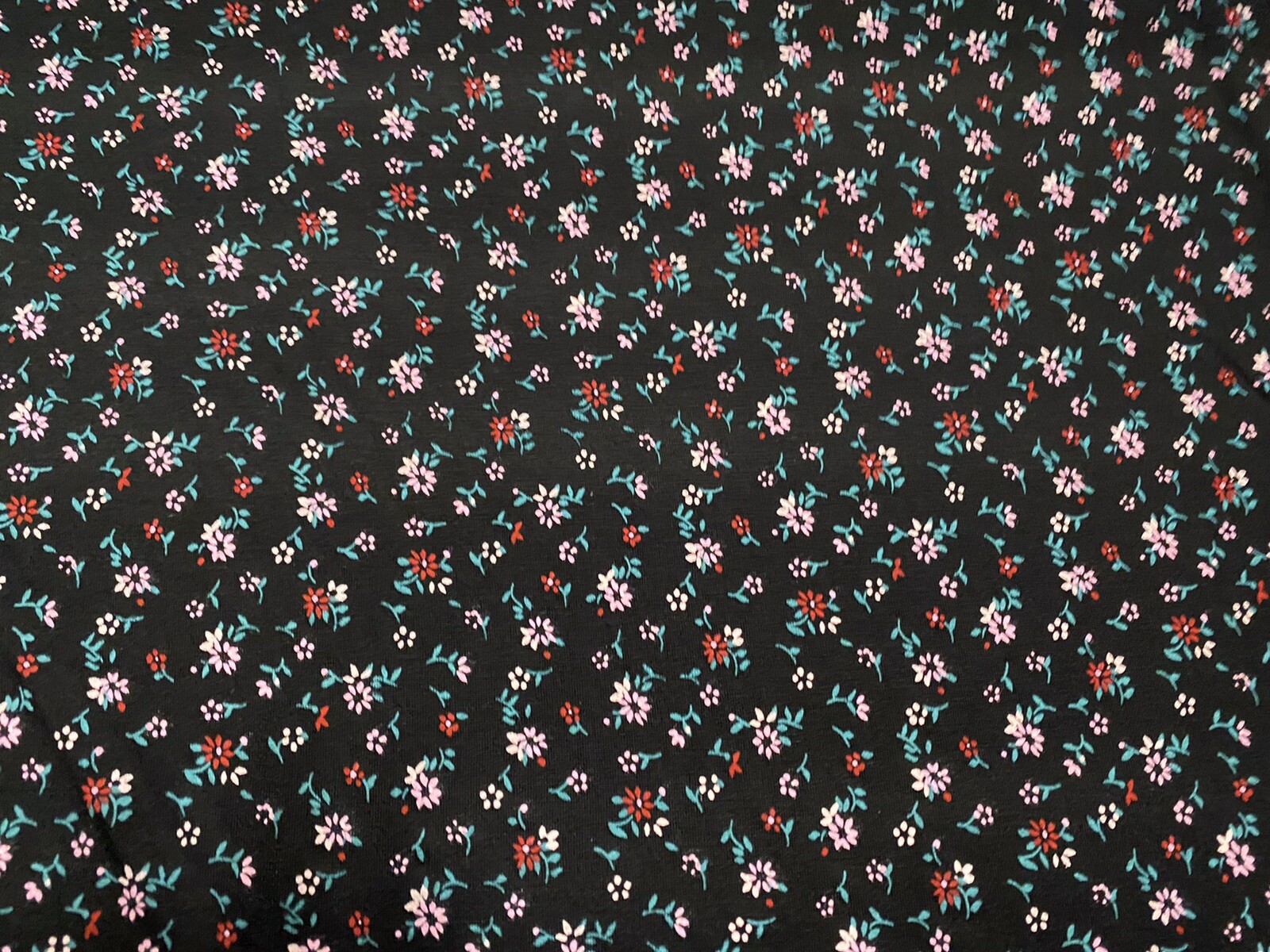 Black Viscose Elastane Jersey Fabric With Pink Ditsy Floral Print, Per
