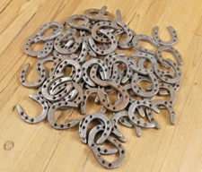 50 SMALL CAST IRON HORSESHOES CRAFTS BARGIN BIN DECOR HORSE SHOE **HAVE RUST**