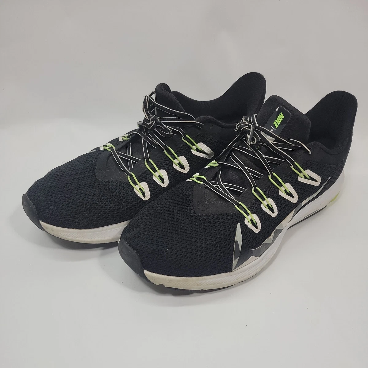 Nike quest camo mens best sale trainers