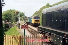 PHOTO  CLASS 47 47635 PASSES 20188 AT CORFE CASTLE DURING THE SWANAGE RAILWAY DI