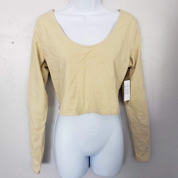 pale yellow long sleeve top
