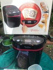 MACHINE A PAIN MOULINEX NOIR /  1 KG / 2 LIVRES RECETTES / AVEC ACCESSOIRES /
