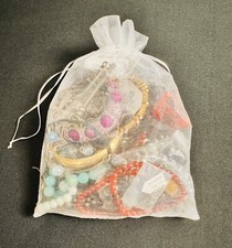A Bag Of Costume Jewelry-Earrings,Necklaces,Bracelets
