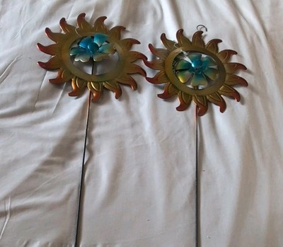 2 Sun with inside wheel moving true Living Outdoors Garden Stakes