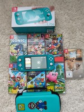 Nintendo Switch Lite Türkis + 8 Spiele   128...