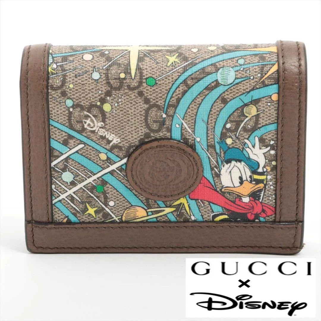 Portefeuille compact GUCCI x Disney Micro GG Supreme
