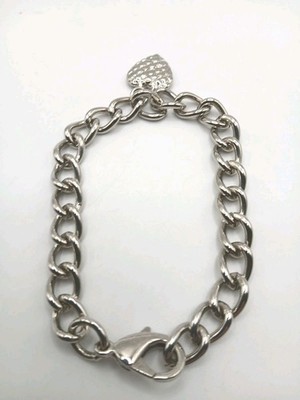 Charm Bracelet  Curb Link With A Heart Charm. 