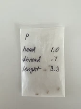 New Piaget 18K gold screw, thread 0.70mm, head 1.00mm, length 3.30mm. One unit.