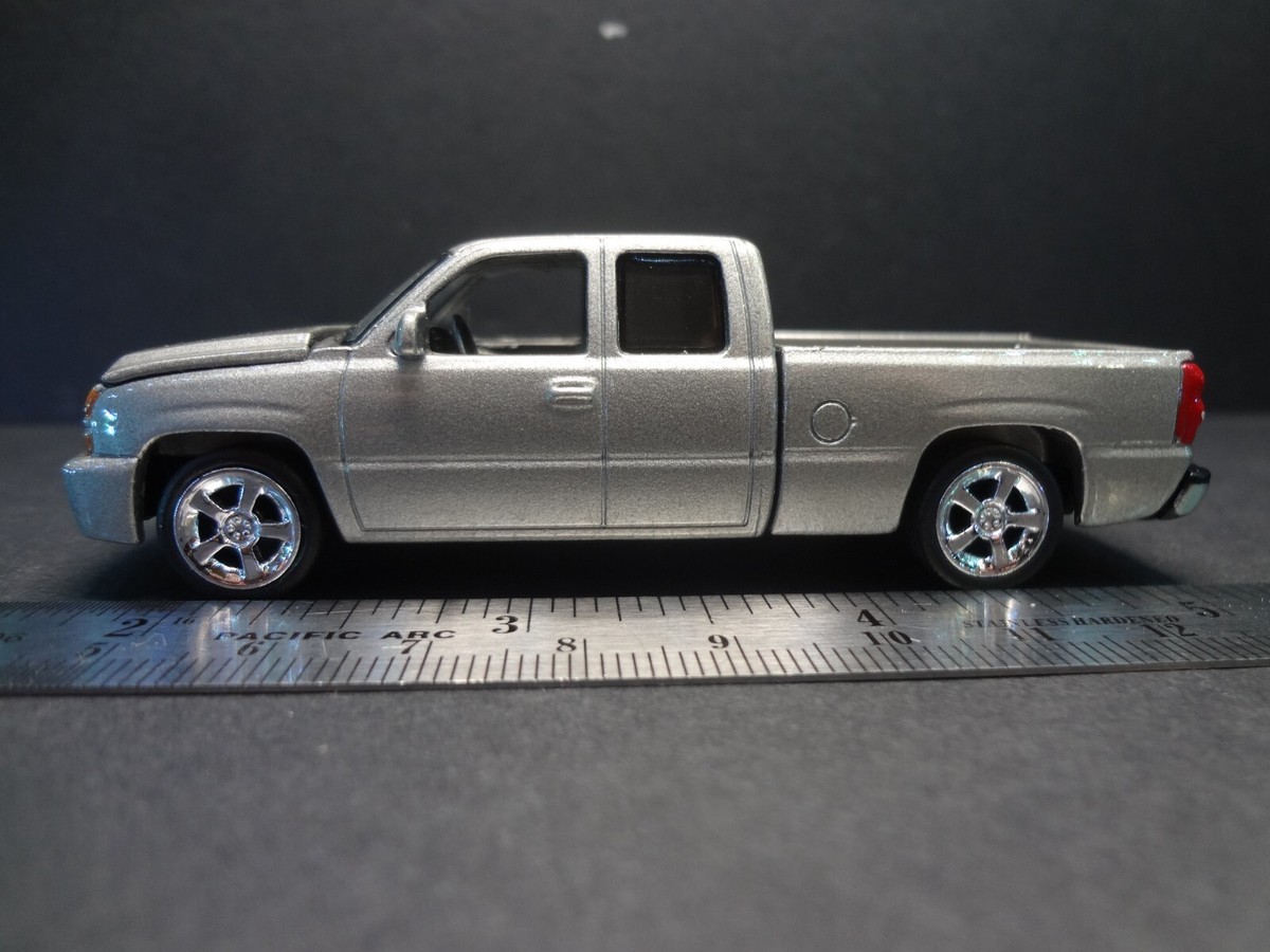 Auto World 2006 Chevy Silverado SS silver birch metallic