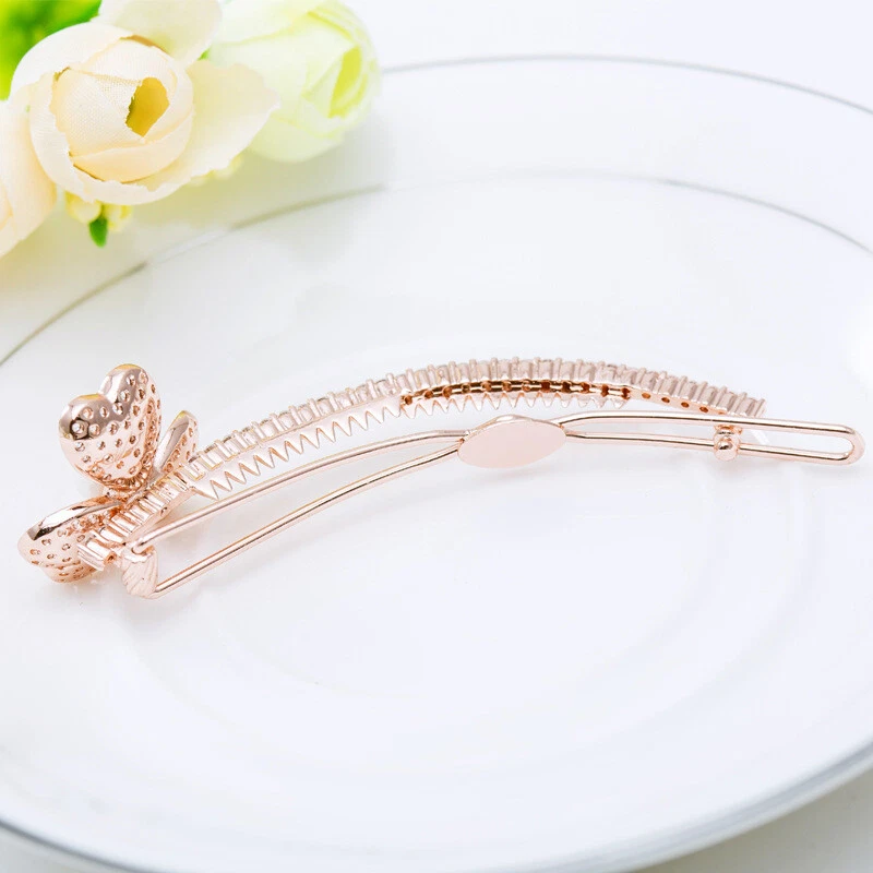 Pinza para el cabello de mujer enchapada en oro con diseño de pétalos de moda micro incrustaciones de circón blanco Foto 3 de 4