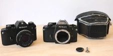 Nikon EM 35mm SLR Film Camera with Nikon 50mm 1.8 Lens 2 Bodies Case for Parts