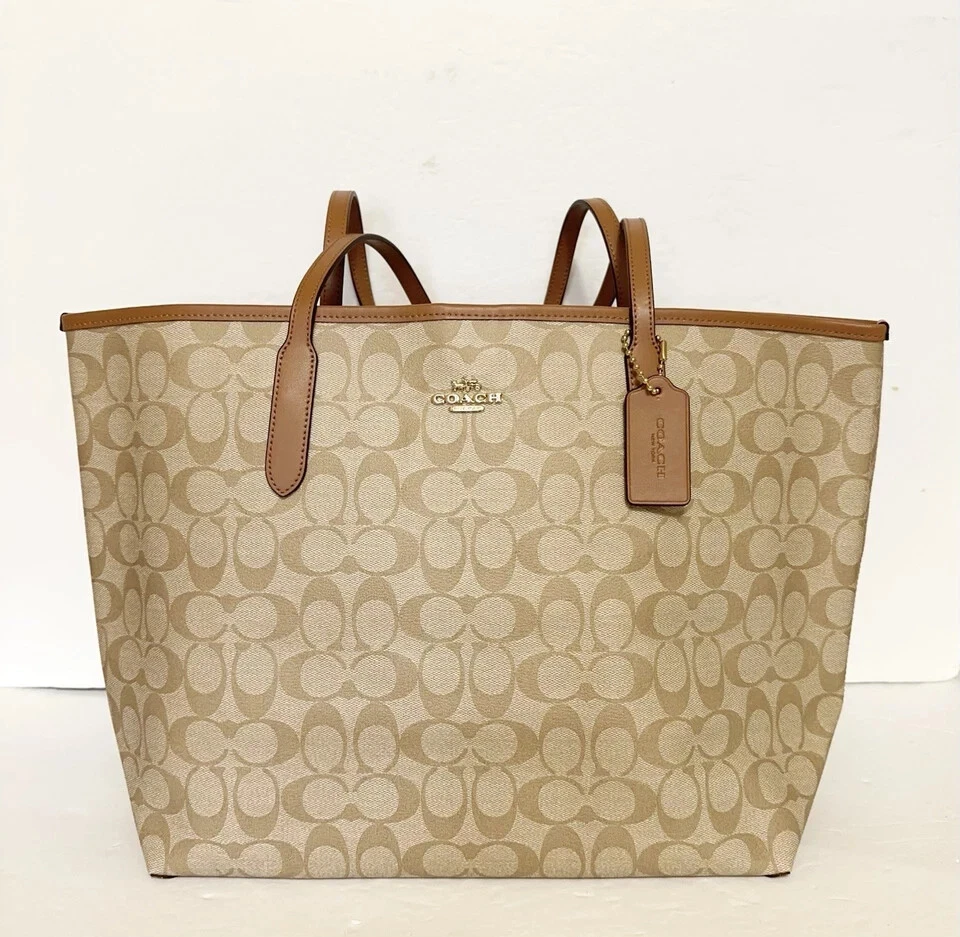 Sella nuova con etichette Coach City Tote in tela firmata 5696 LT cachi LT