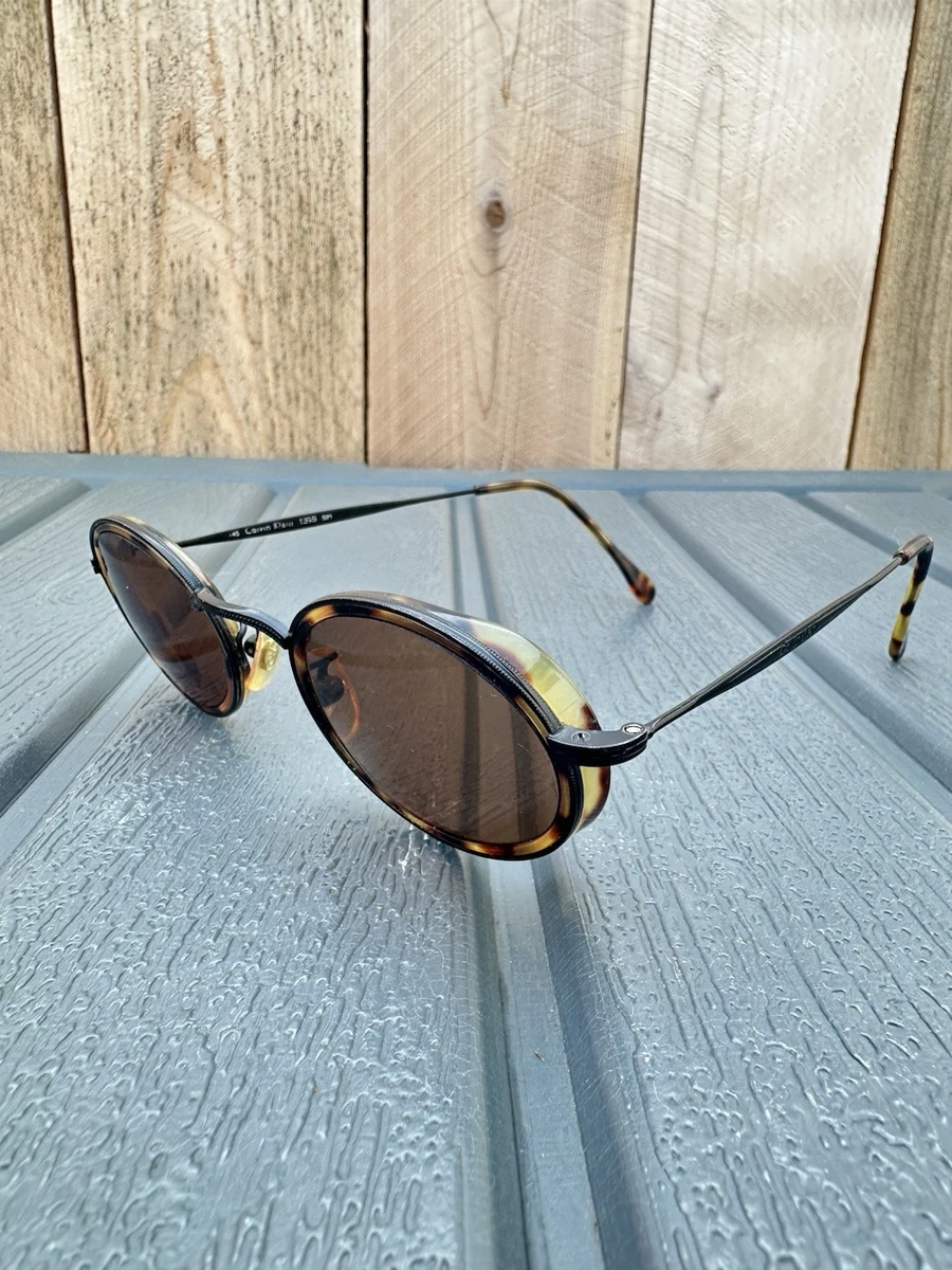 Calvin Klein Brown Oval Sunglasses for Women for sale | eBay display picture 3