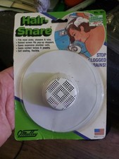 O'Malley Manufacturing Inc. white flexible PVC drain cover commonly Hair Snare