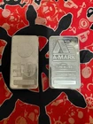 Two 10 oz silver bars.999.