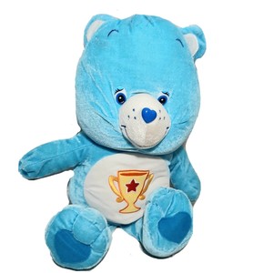 care bear with trophy on belly