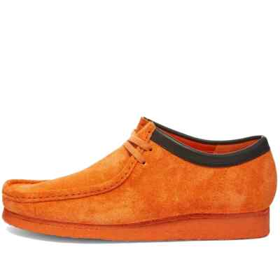 #ad wallabee low orange $130.00