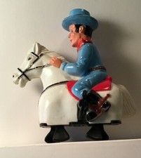 Vintage Wind up Cowboy Riding a White Horse - 4 in. Tall- It Works Fine. 1975