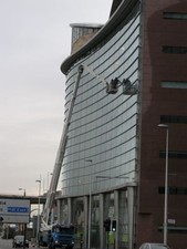 Photo 6x4 Window cleaning Glasgow Glass clad building Broomielaw. c2007