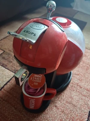Krups Nespresso pod cofee machine, used. Red color, remowable water tank.