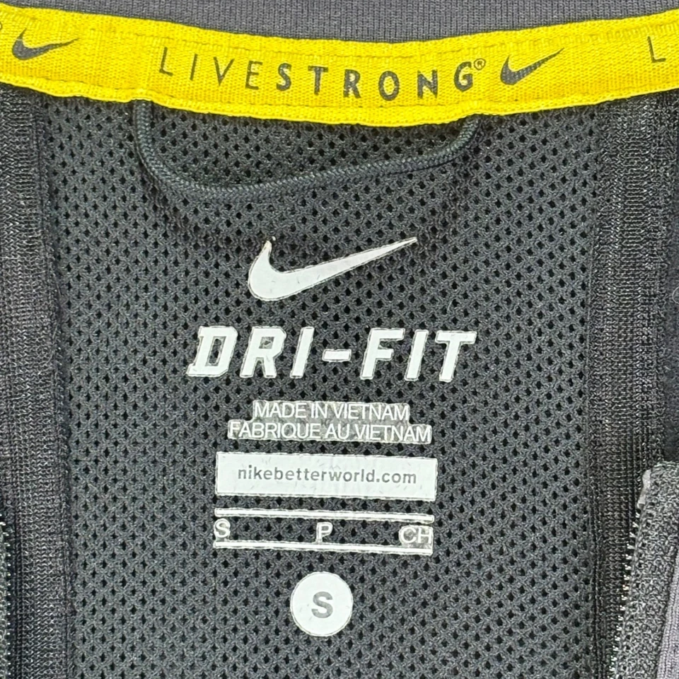 Chaqueta para mujer Nike Dri-Fit negra amarilla ribete Livestrong cremallera completa talla pequeña Foto 2 de 4