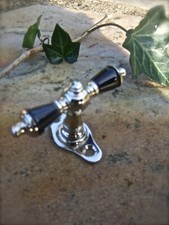 Klamki okienne Greencurrent wykonane z niklu polerowane-błyszczące, uchwyty czarne